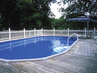 oval pool with composite wood side deck
